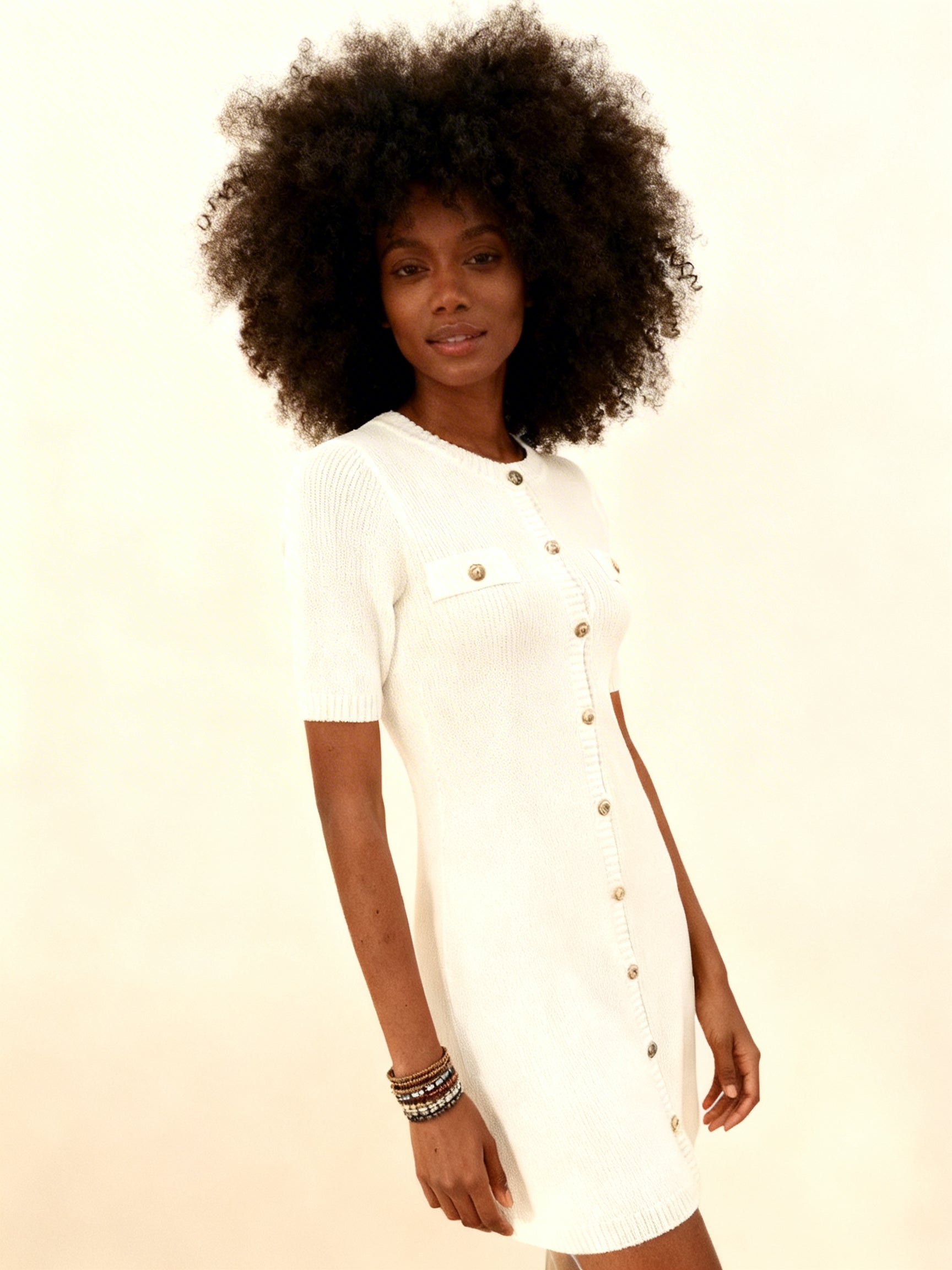 Vestido mini punto botonadura dorada